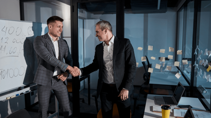 businessman making M&A deal with help of tax strategist